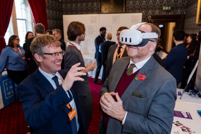 Man demonstrating VR headset at event
