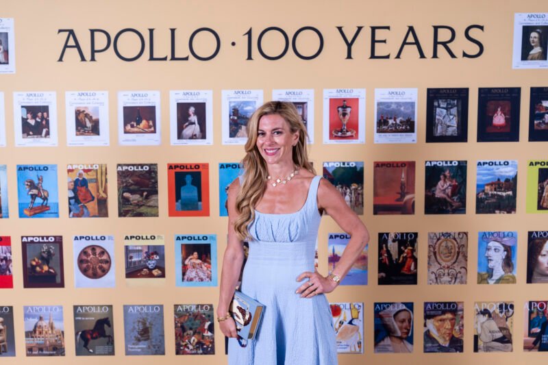 Smiling woman at Apollo magazine's 100-year celebration.