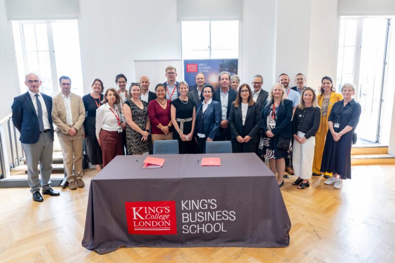 Group at King's College London business school event.